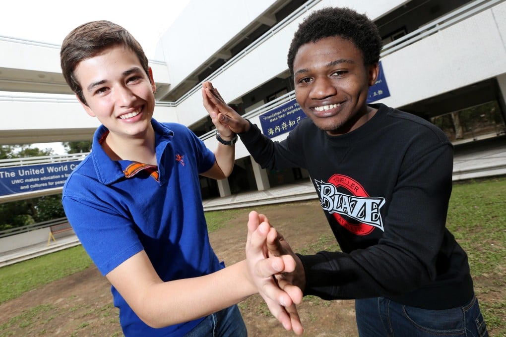 Li Po Chun United World College's student Odilon Numugabo (right) poses with Esteban Lemus Wirtz from Guatemala. Photo: David Wong