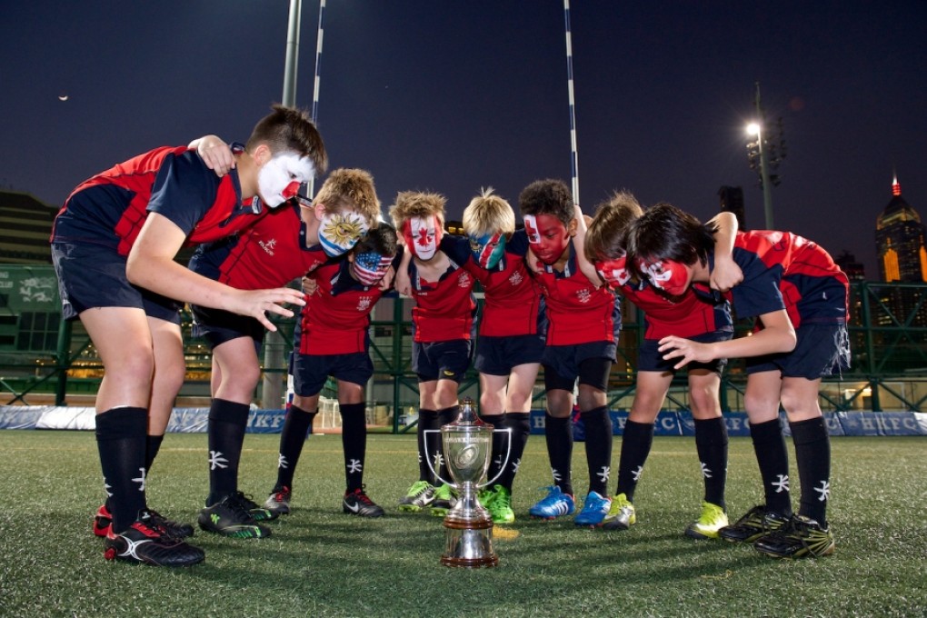 Youngsters with their faces painted in the colours of competing countries promote the Junior World Rugby Trophy being held in Hong Kong. Photo: HKRFU