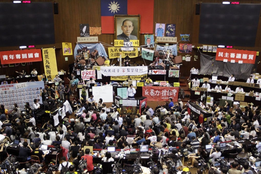 Taiwanese students occupied the Legislative Yuan to protest against a trade pact with mainland China.
