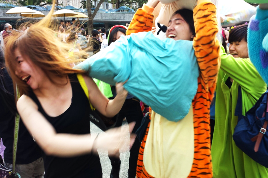 Hong Kong's annual Pillow Fight Day attracted hundreds on Saturday. Photo: SCMP