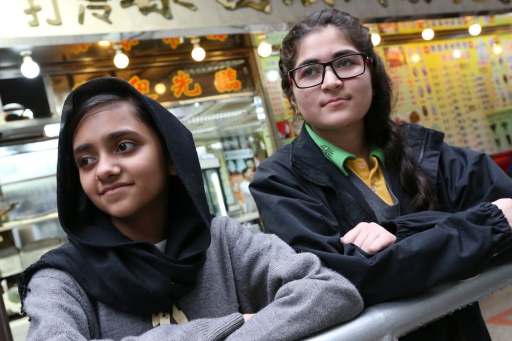 Afsa Fatima (left), 15, and Sehrish, 16, both grew up in Hong Kong but found it extremely hard to learn Chinese because of literally no support from schools nor the government.