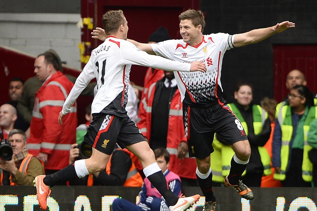 Steven Gerrard celebrates his winning penalty. Photo: Reuters