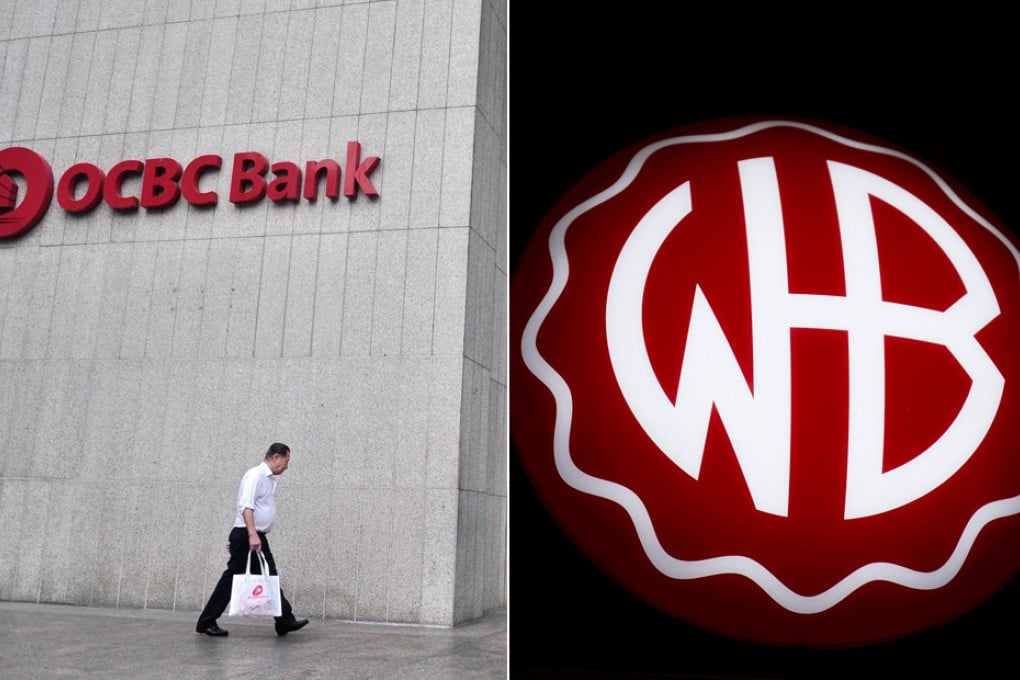 Questions have been raised over the price OCBC paid in taking over Wing Hang Bank. Photos: AFP, Bloomberg