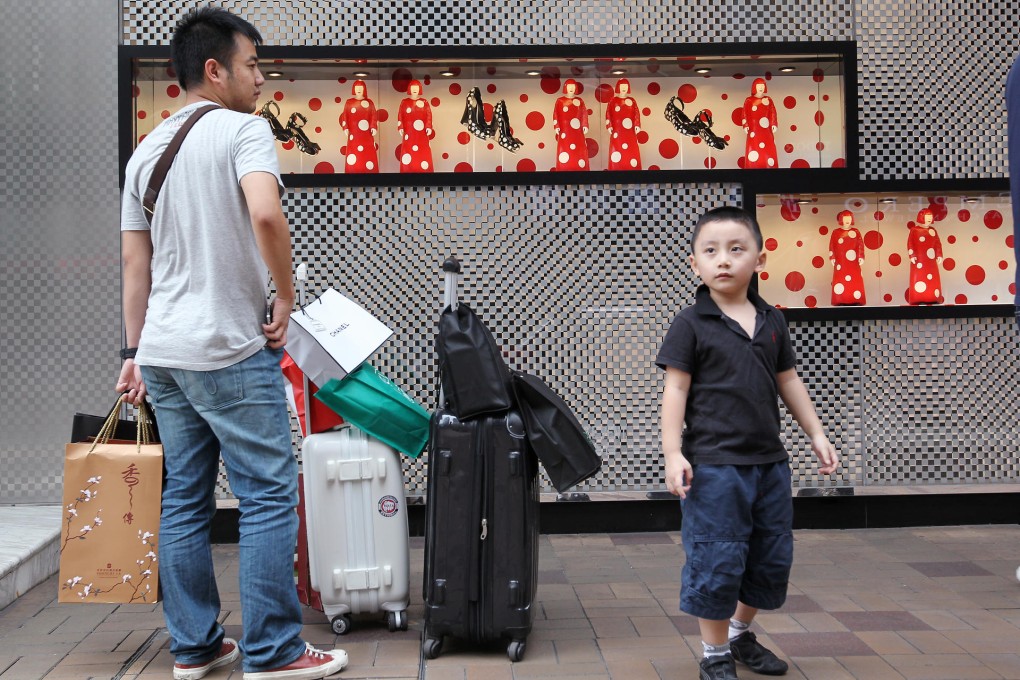 Mainland visitors are not buying only luxury products when they visit Hong Kong but also insurance policies. Photo: Dickson Lee