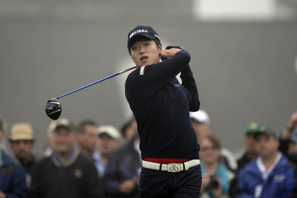 South Korea's Lee Chang-woo hits a tee shot during a practice round on Monday. Photo: AFP