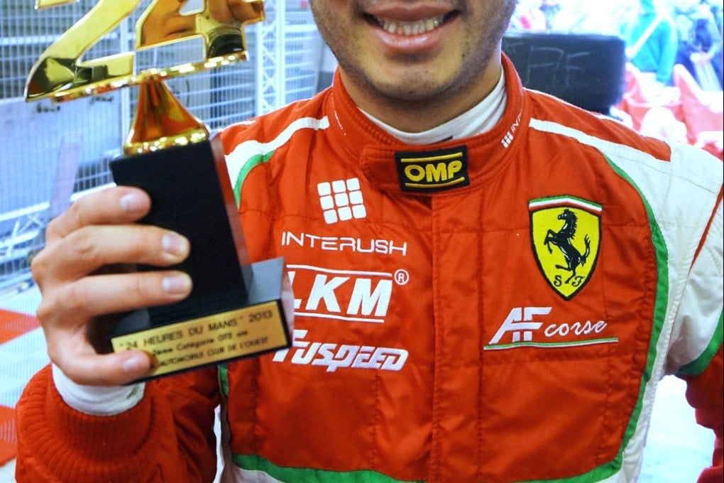 A beaming Darryl O'Young with his trophy after finishing second in the GTE-Am class of Le Mans 24-hour endurance race last year. Photo: SCMP Pictures
