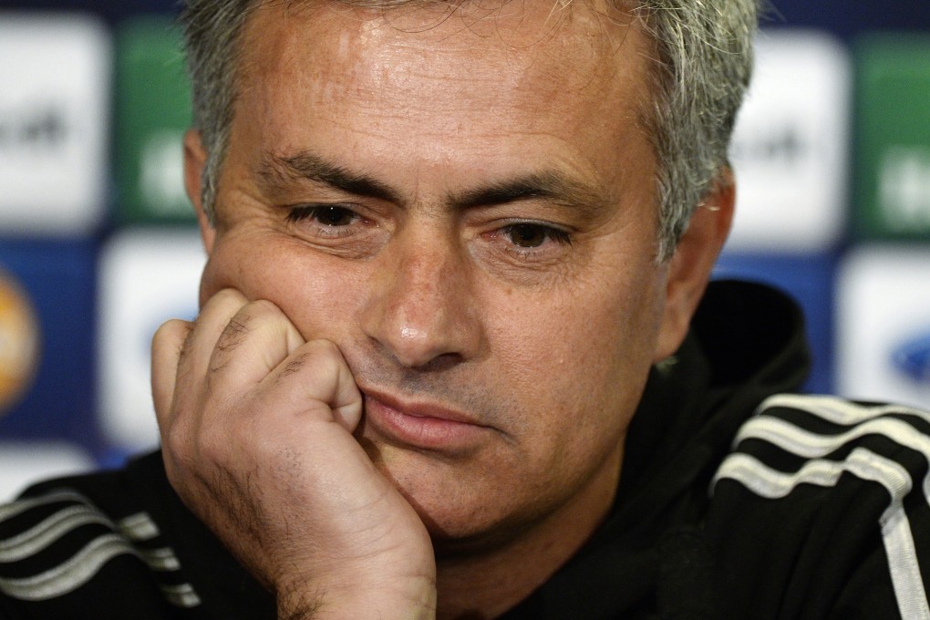 Jose Mourinho looks unimpressed by the press' line of questioning. Photo: EPA