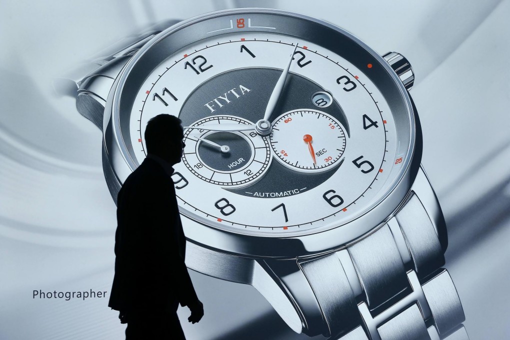 A poster for Chinese watch company Fiyta is seen at the Baselworld watch and jewellery fair, which ended last week. Photo: Reuters