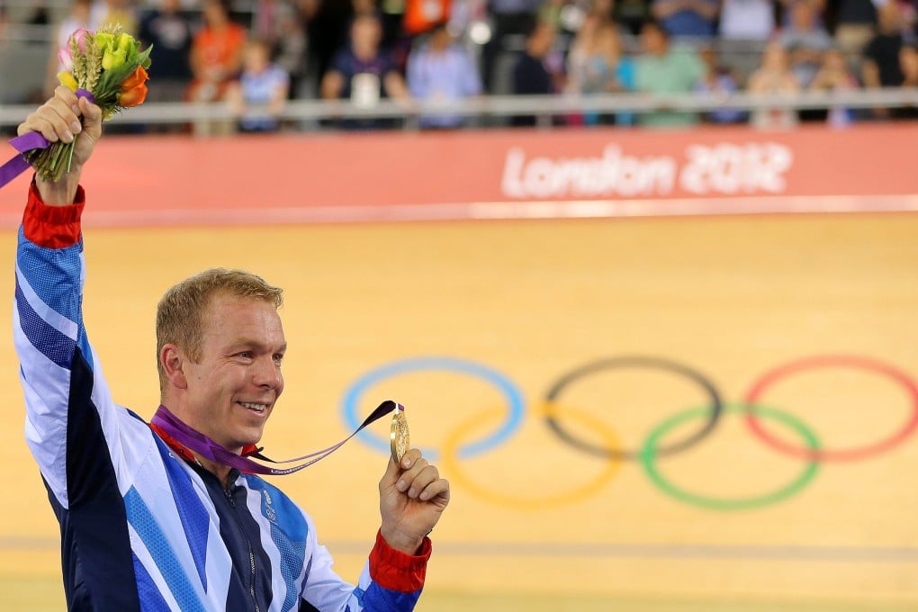 Chris Hoy stands on the podium after winning gold in the men's keirin at the London Olympics in 2012. Photo: EPA