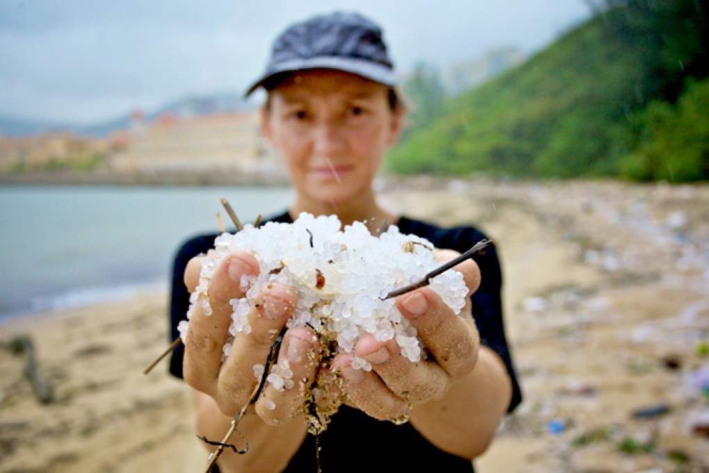 A handful of pre-production plastic pellets that were washed ashore after Typhoon Vincente in July 2012.