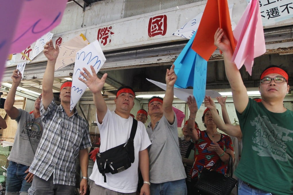 A protest against evictions stemming from an URA redevelopment.Photo: Sam Tsang