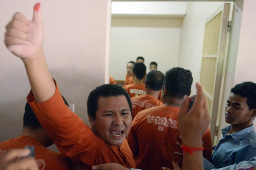 One of the convicted men yells he is innocent. Photo: AFP