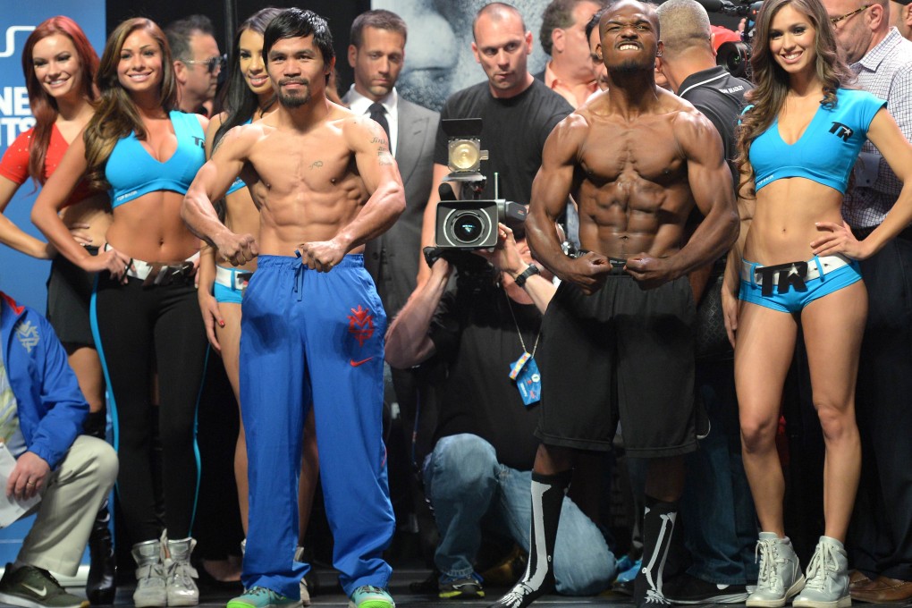 Manny Pacquiao and Timothy Bradley pose during the weigh-in session. Photos: AFP