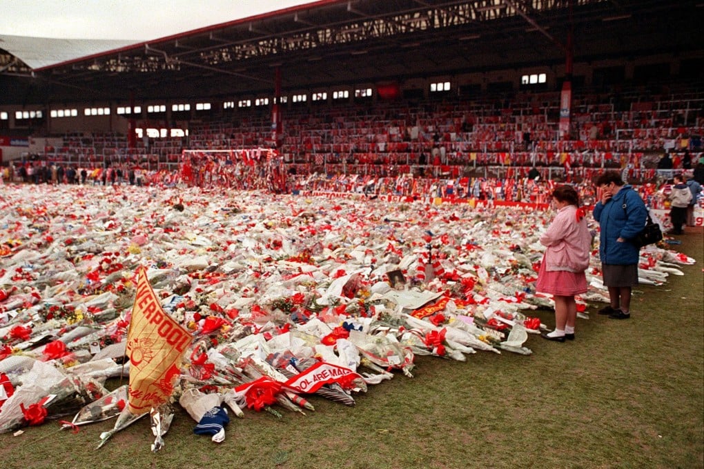 Thousands of bunches of flowers, wreaths and tributes lie on the pitch at Anfield stadium in Liverpool in the aftermath of the Hillsborough disaster in 1989. Photo: AFP