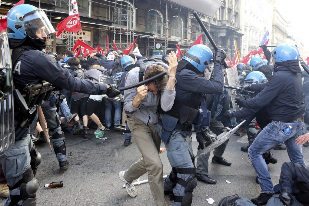 Demonstrators clash with riot police during the Rome protests. Leftist groups turned violent during the event. Photo: Reuters