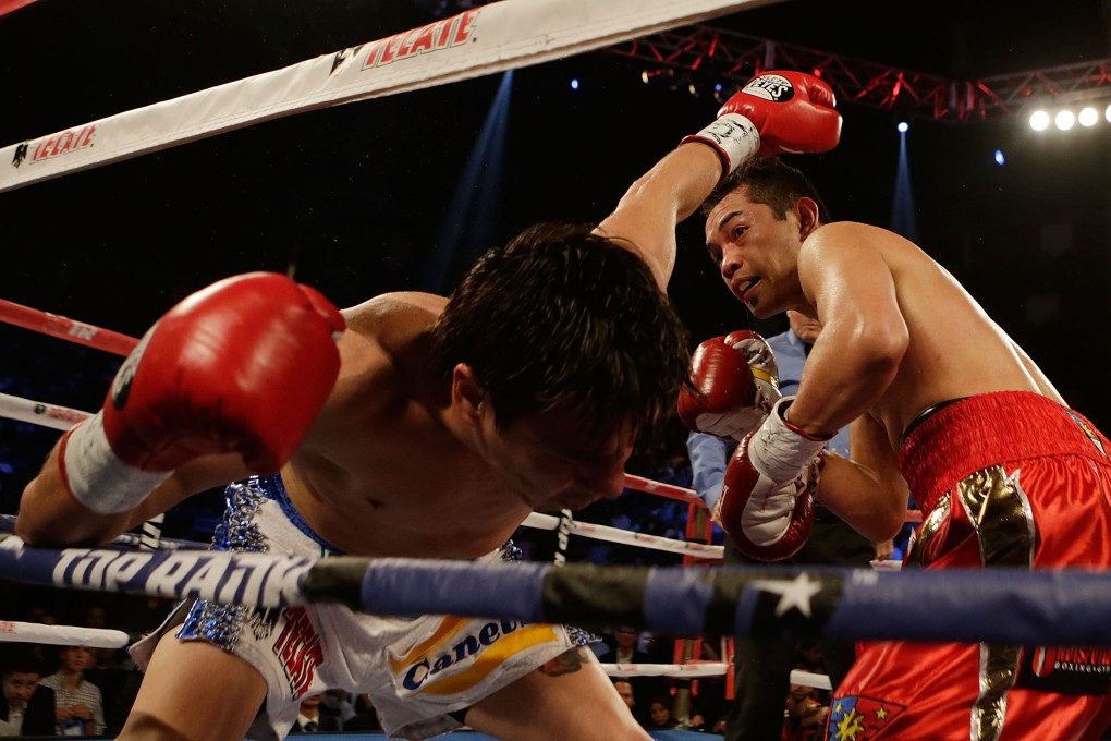 Nonito Donaire of the Philippines (right) knocks out Jorge Arce of Mexico in their WBO world super bantamweight bout in Houston, Texas, in December 2012. Photo: AFP