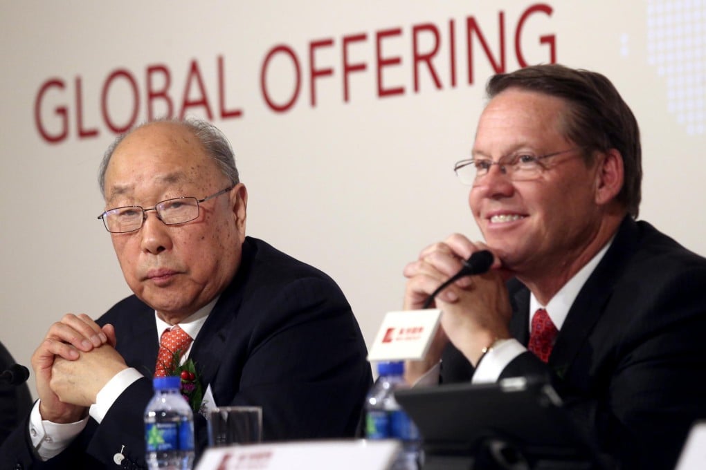 WH Group's Wan Long and Smithfield president Larry Pope at the press conference on the mainland firm's listing plan. Photo: David Wong