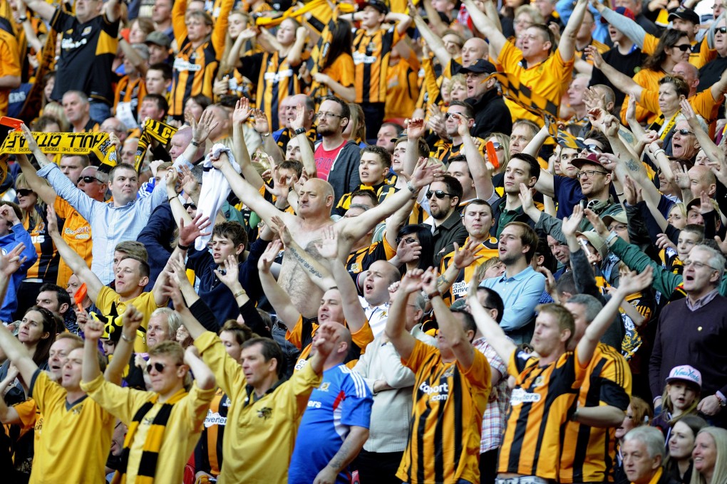 Hull City fans celebrate beating Sheffield United 5-3. Photo: EPA
