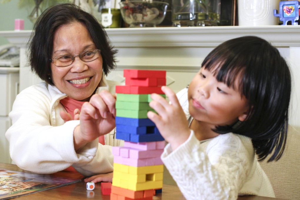 Zenaida Cabello (left) and her employer's daughter, Annabelle Sun.