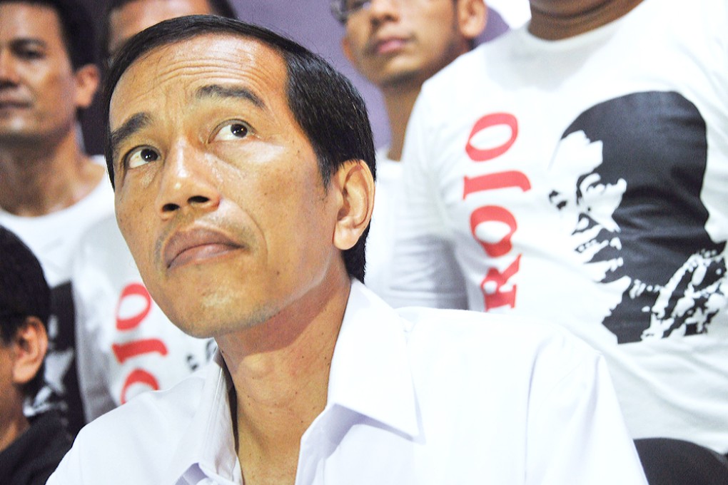 Popular presidential candidate of main opposition party Indonesian Democratic Party of Struggle (PDI-P) and Jakarta Governor Joko Widodo. Photo: AFP