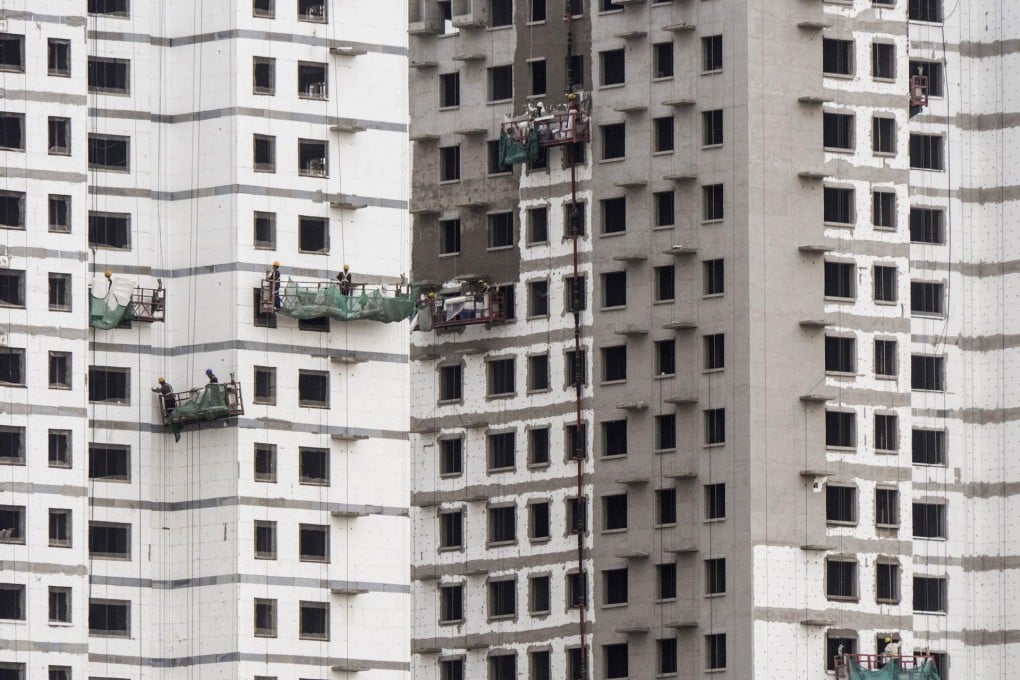 Softer home prices and reports that developers have cut project prices to boost sales have rattled investors. Photo: EPA