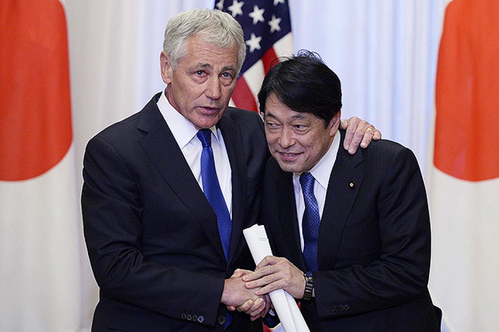 The US and Japanese defence chiefs. Photo: AFP