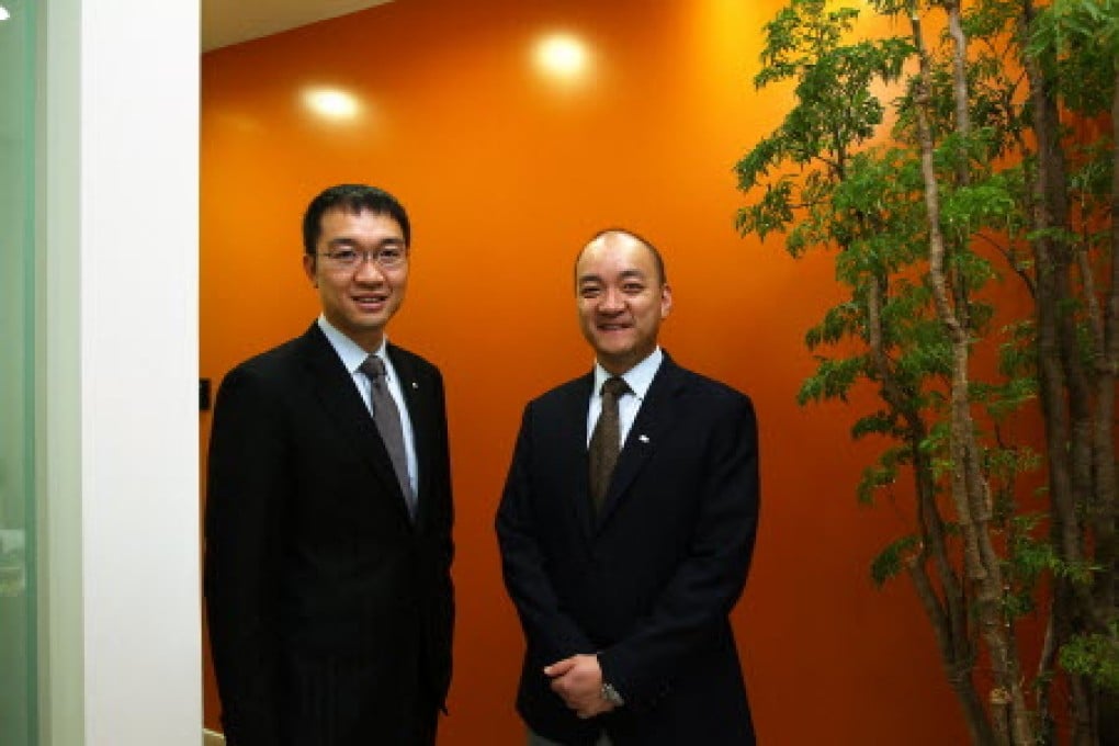 Derrick Pang Yat-bond and Dominic Pang Yat-ting succeeded their father in taking the reins of the firm in 2010. Photo: Jonathan Wong