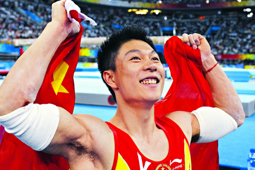 Hunan Gymnastics School has produced some of the nation's best athletes, including parallel bars master Li Xiaopeng. Photo: AFP