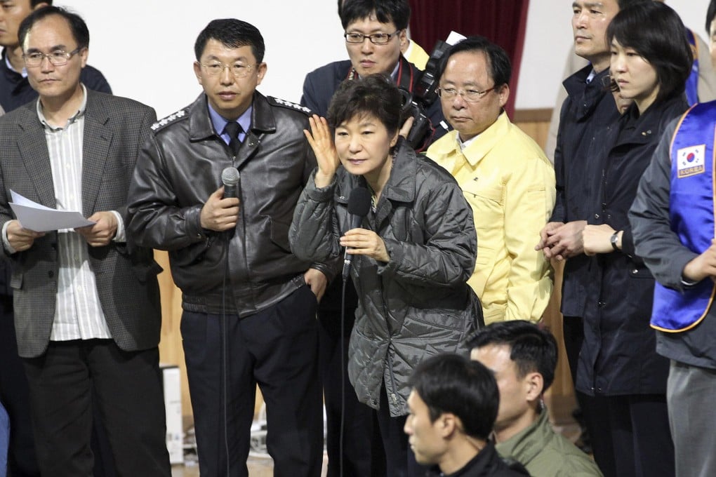 Park Geun-hye listens to the parents' questions. Photo: AP