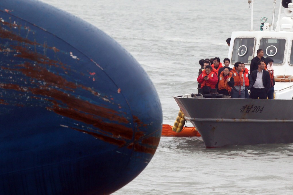 Relatives of missing passengers visit the area where the ferry sank off Byeongpung island. Photo: AFP