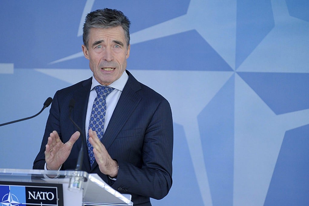 NATO Secretary-General Anders Fogh Rasmussen holds a news conference at the Alliance's headquarters in Brussels on Wednesday. Photo: Reuters
