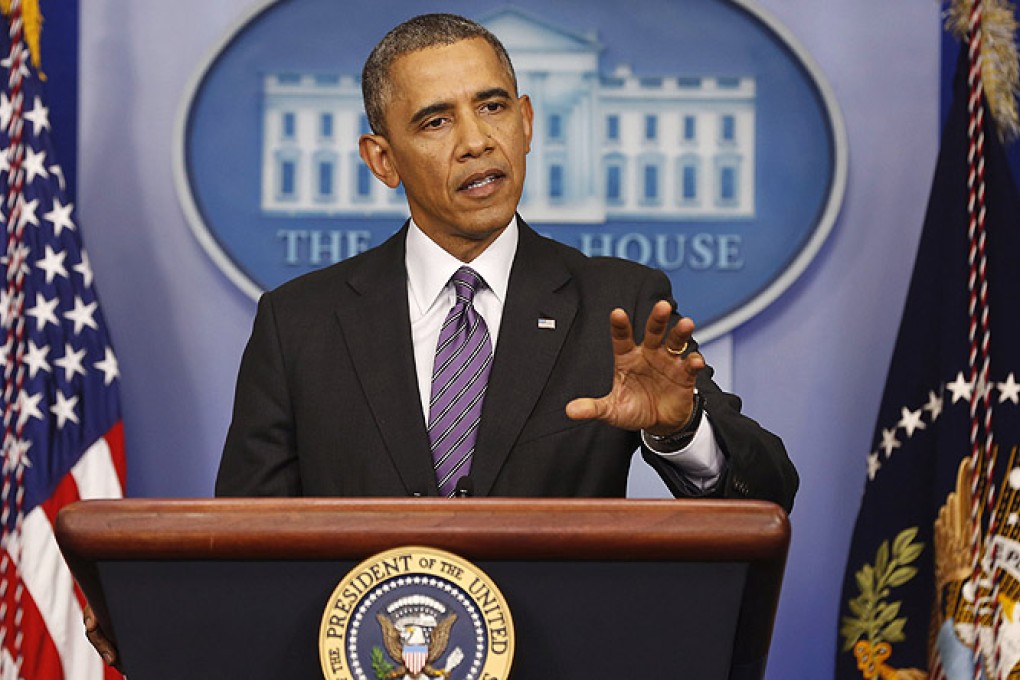 The US president briefs the press at the White House on progress implementing Obamacare. Photo: Reuters