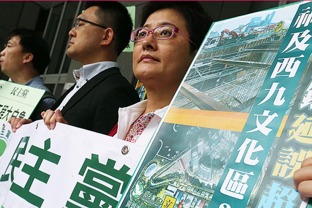 Legislator Wu Chi-wai (left), Helena Wong Pik-wan (right) and members of the Democratic Party demand that the government release all documents relating to the delay in the Express Rail Link project at Legco Building in Tamar. Photo: K. Y. Cheng