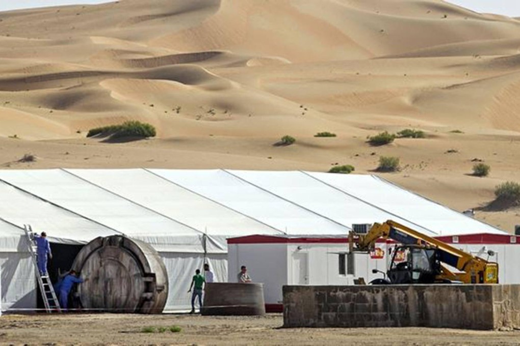 Crews roll out an object believed to be for a new Star Wars film being shot in Abu Dhabi.