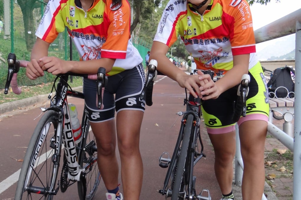 Hong Kong cyclists Tammi Kong Yan-pui and Esther Fung Yuk-ki. Fung was arrested for not cycling on a designated cycle path. Photo: SCMP Pictures