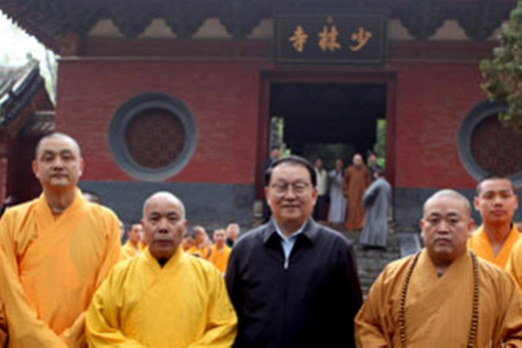Li Changchun with Abbot Shi Yongxin (right) at the Shaolin Temple.
