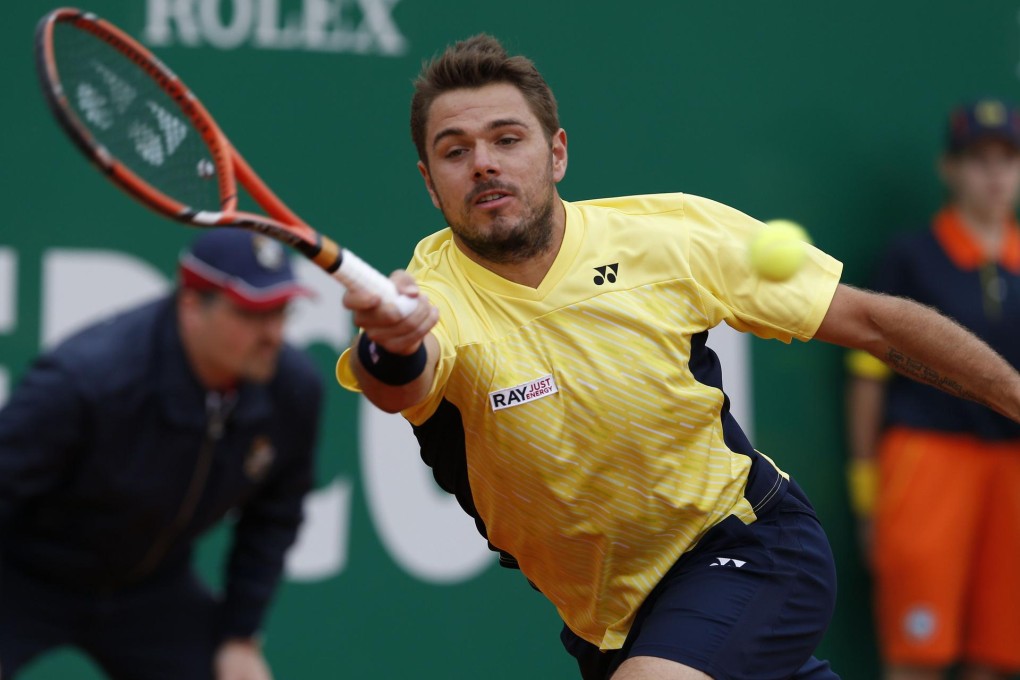 Stanislas Wawrinka on his way to victory over fellow Swiss Roger Federer. Photo: AFP