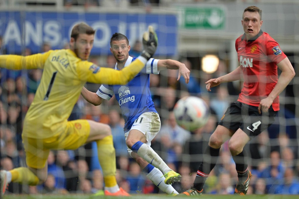 Everton striker Kevin Mirallas (centre) scores his team's second goal in their 2-0 win over Manchester United at Goodison Park. Photo: AFP