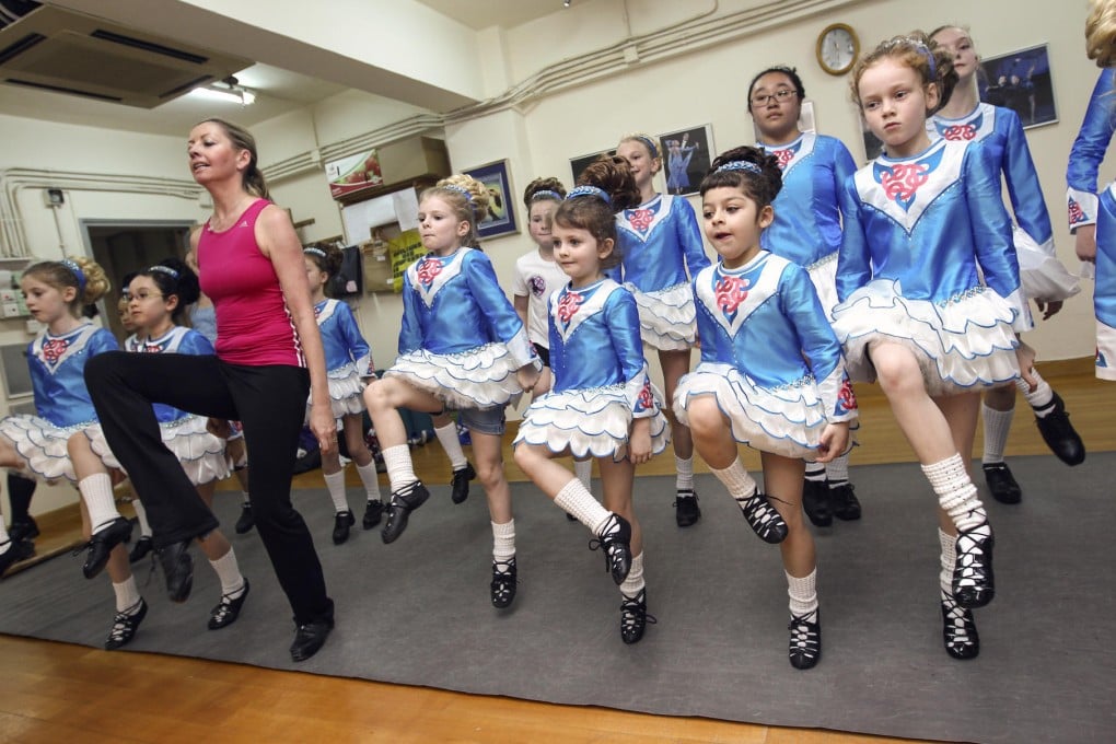 Teacher Kathryn O'Connor-Barton leads Irish dancing students in practice at Herman Lam Dance Studio in Central. Photo: Jonathan Wong