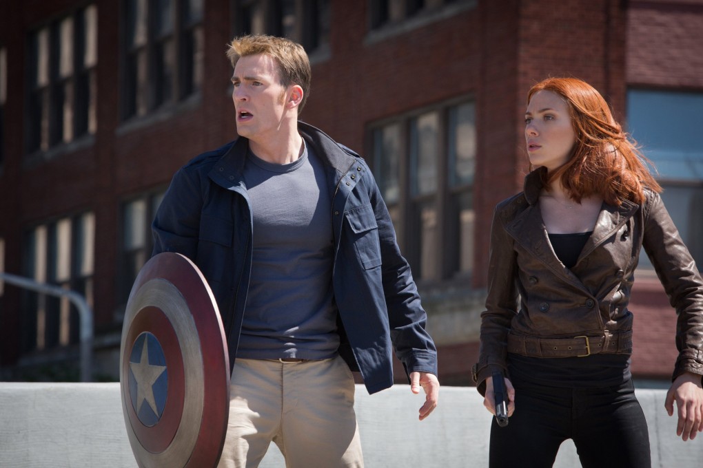Captain America: The Winter Soldier, starring Chris Evans, left and Scarlett Johansson, remains top of the US box office for a third week. Photo: Marvel Studios/MCT