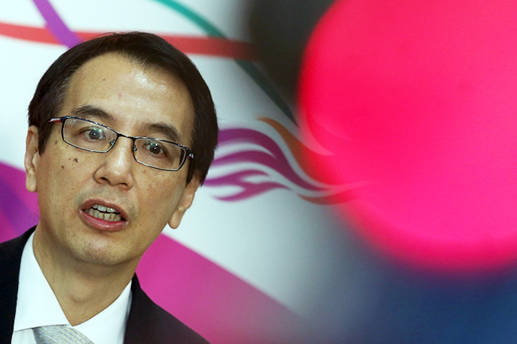 Secretary for the Civil Service Paul Tang talks about the government's proposal that the retirement age for new civil servants rises to 65. Photo: K.Y. Cheng