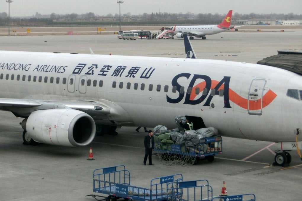 Shandong Airlines, one of the mainland's smaller commercial carriers, hopes to boost its fleet to 140 aircraft by 2020. Photo: EPA