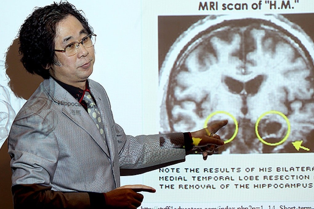 Professor He Jufang of the department of Biomedical Sciences at City University, attendsa  press conference about the discovery of "memory ink" which promises new hope for Alzheimer's disease sufferers. Photo: Dickson Lee