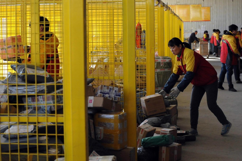 Logistics, inventory and warehousing are costly and labour intensive activities for e-commerce operators like Alibaba. Photo: AFP