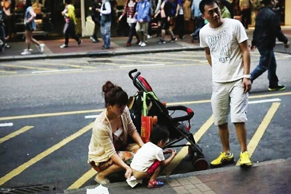 Hongkongers scuffled with the mainland couple after they allowed their toddler to relieve himself on a busy street in Mong Kok. Photo: SCMP Pictures