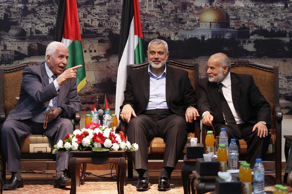 Rival Fatah and Hamas negotiators hammer out a unity agreement. Photo: Reuters