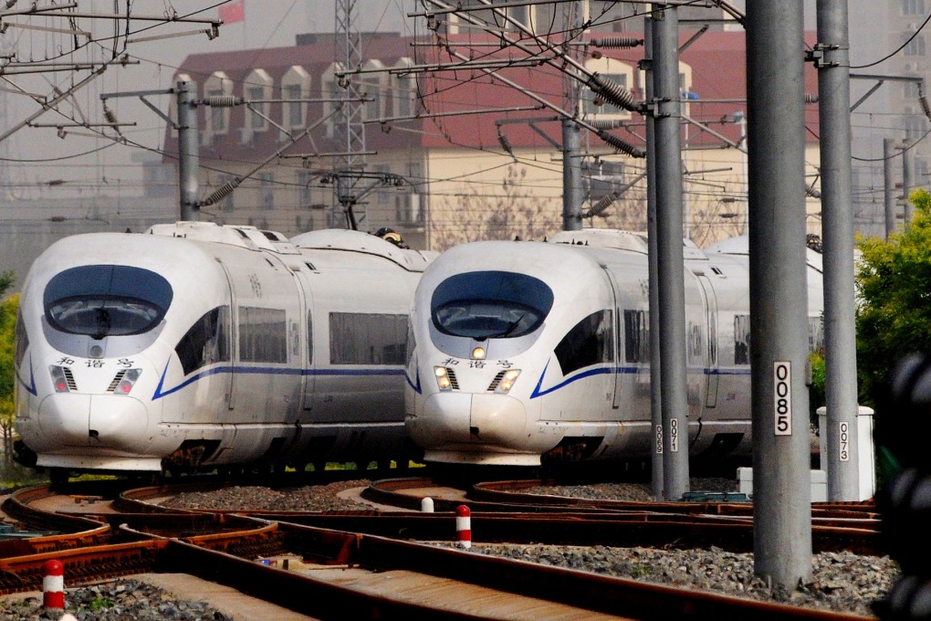Photo taken on April 29, 2012 shows two CRH high-speed intercity trains, which travel between Beijing and Tianjin, at Tianjin Railway Station in north China's Tianjin Municipality. Photo: Xinhua