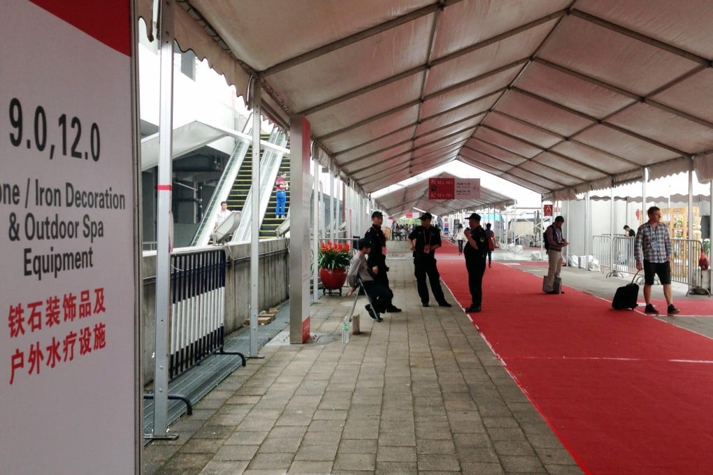 The opening day of Canton Fair's second phase, featuring stone and iron decorations and outdoor spa equipment, leaves many sellers disappointed. Photo: Keira Lu Huang