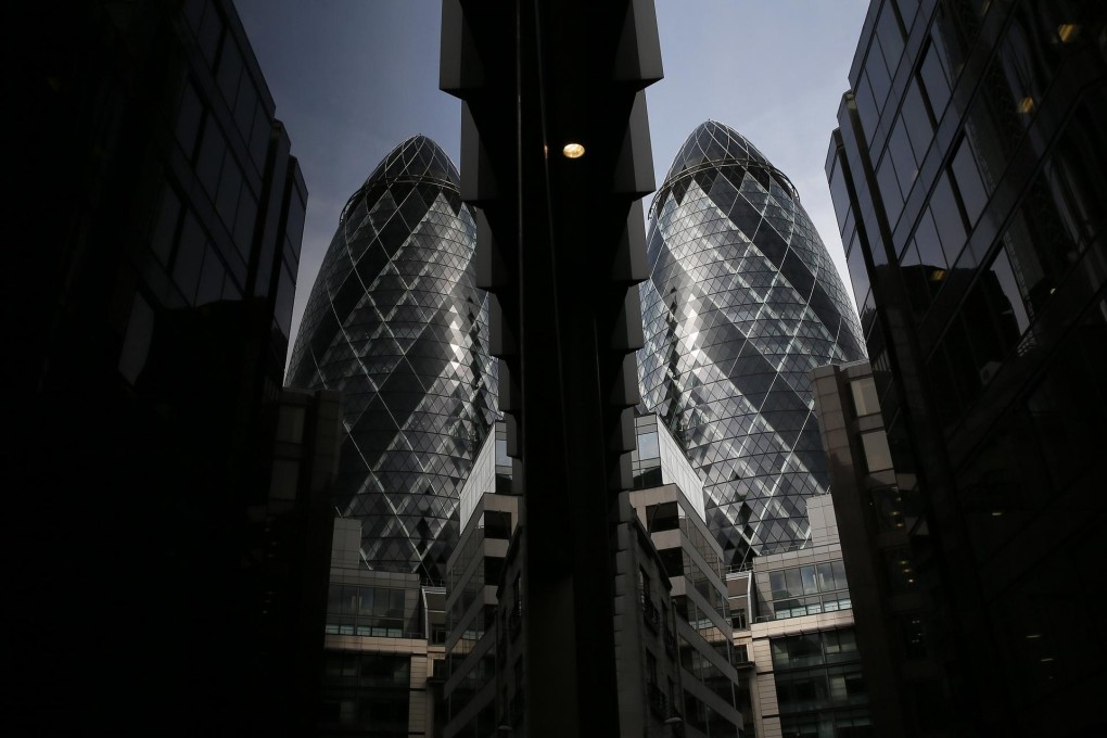 A reflected view of The Gherkin skyscraper in London, which won multiple architectural awards but is now in receivership. Photo: Reuters