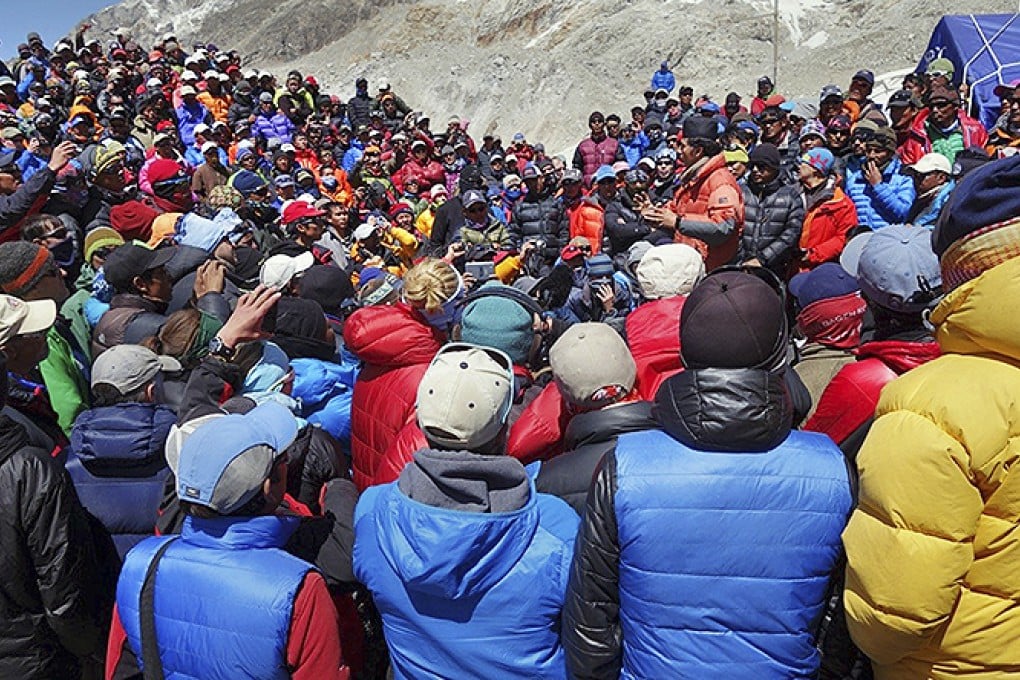 A meeting between a Nepalese government delegation and Sherpa mountain guides takes place near Everest base camp. Photo: AP
